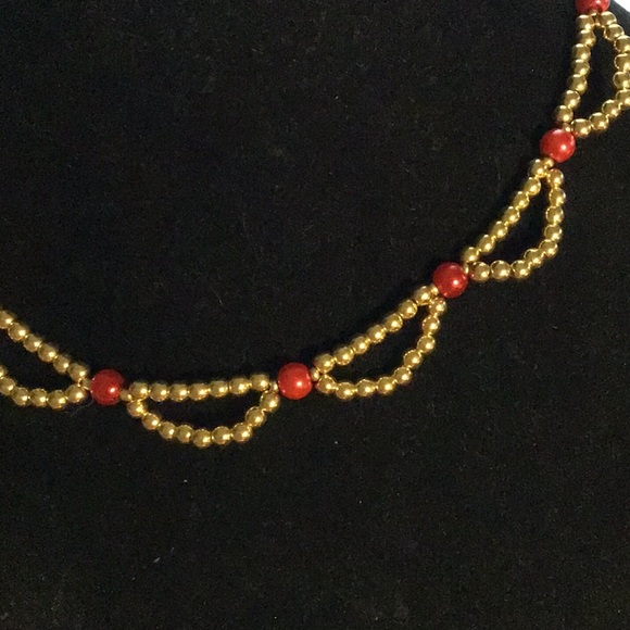 women's gold metal necklace with red faux pearls and a large lobster claw clasp - Picture 2 of 6